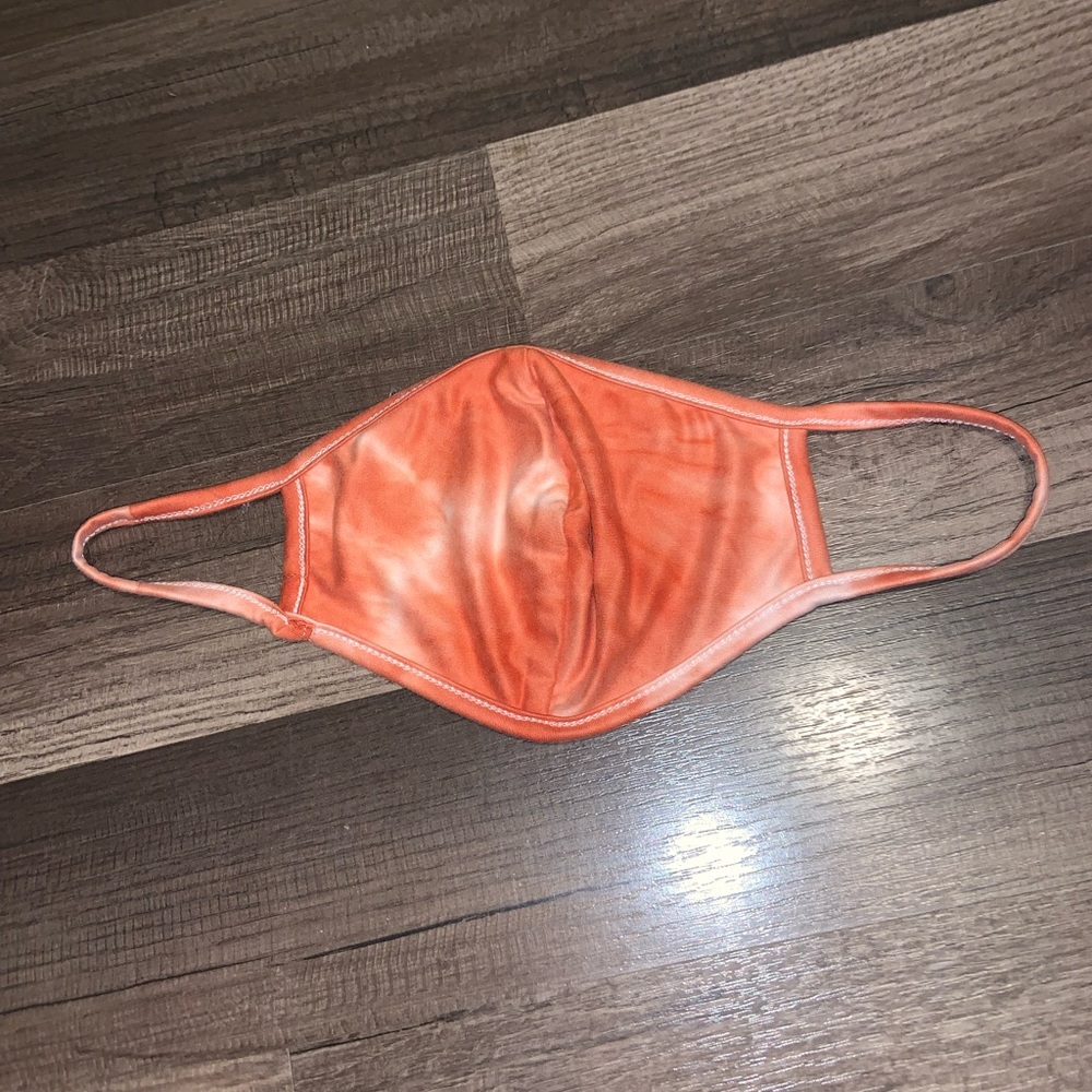 Walmart unused Woman’s Orange and White tie dye mask